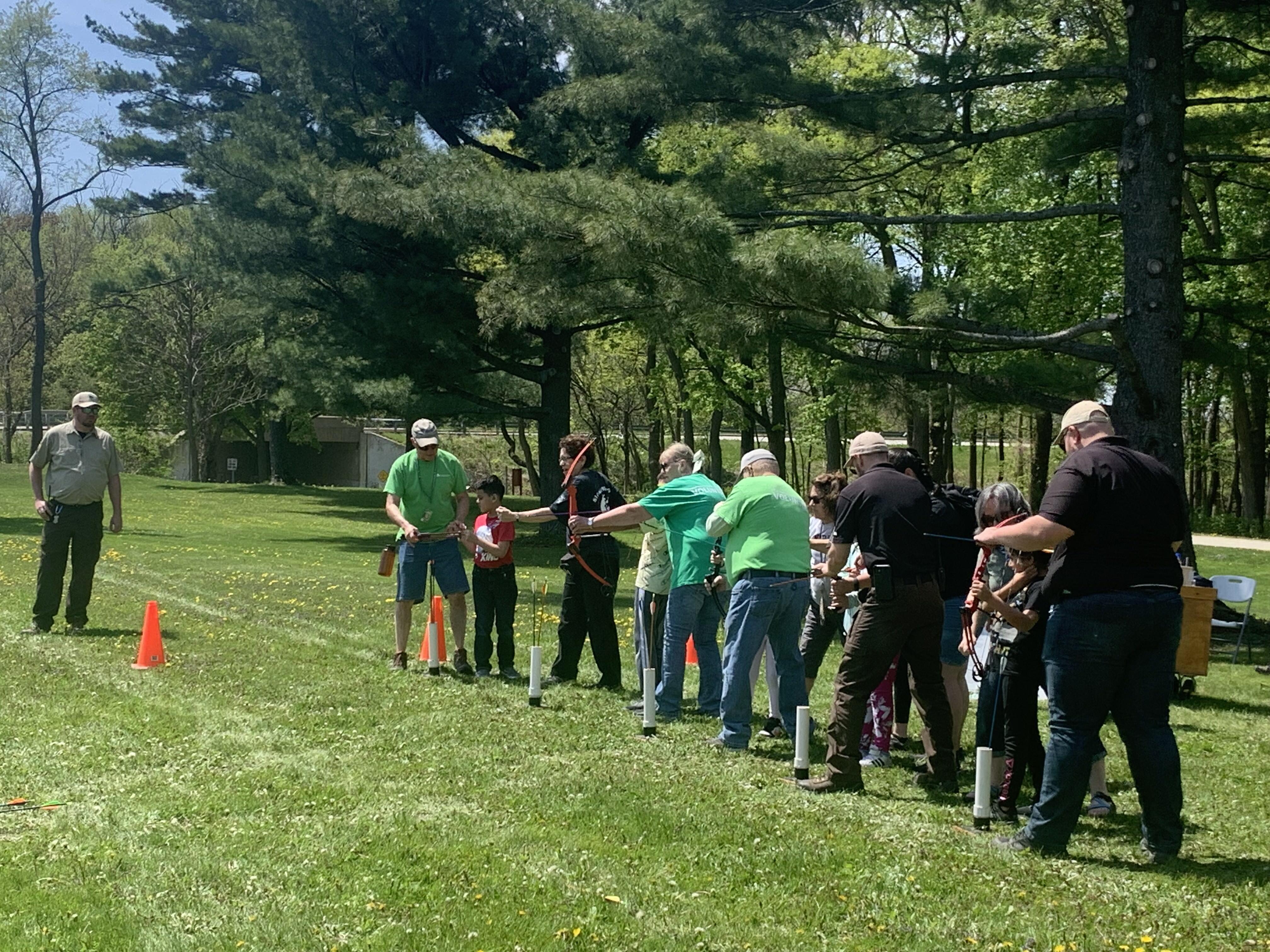 Students learning archery