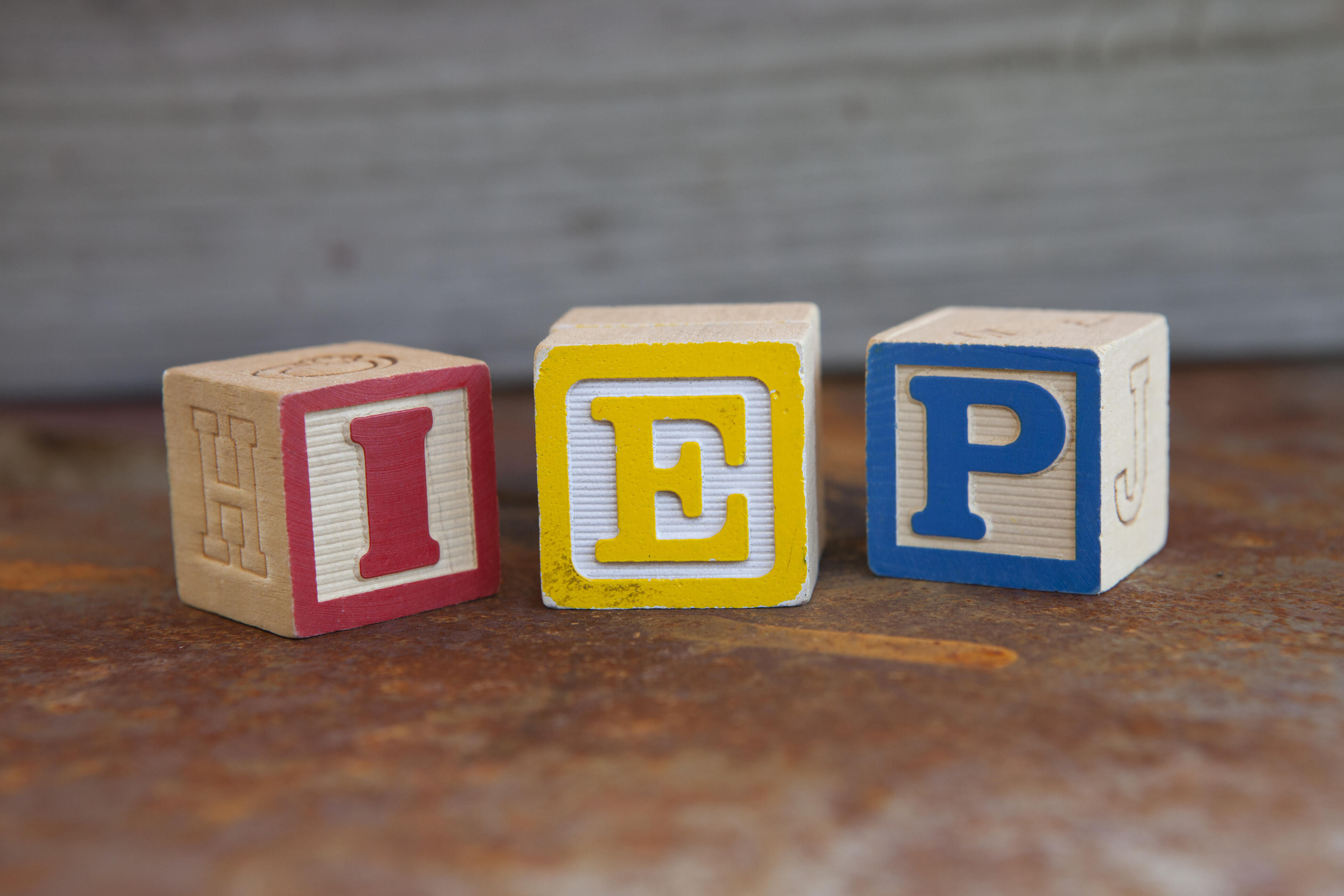Picture of blocks with letters, I, E, and P